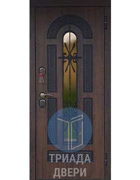 металлическая дверь тёмно-коричневого цвета с ковкой поверх стекла